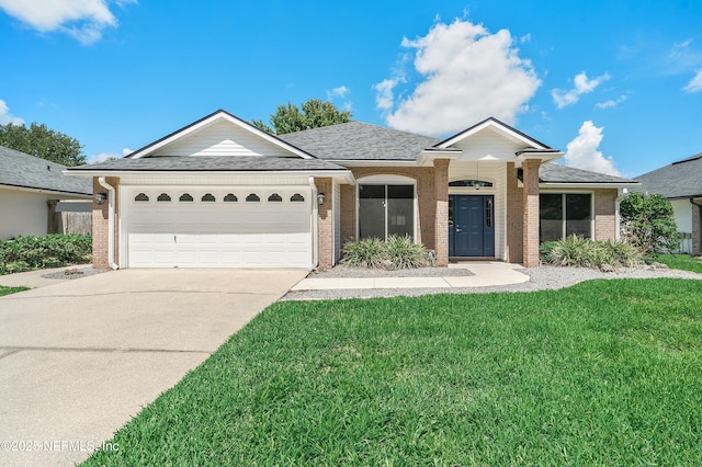 429 N Bridgestone Ave, Saint Johns, FL 32259 - single story home with brick siding, an attached garage, and concrete driveway
