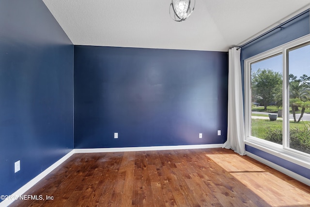 429 N Bridgestone Ave, Saint Johns, FL 32259 - unfurnished room featuring lofted ceiling and hardwood / wood-style flooring
