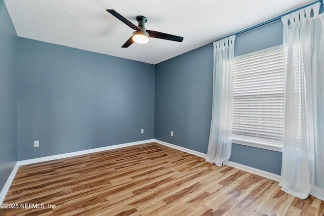 429 N Bridgestone Ave, Saint Johns, FL 32259 - spare room with wood finished floors, ceiling fan, and a textured ceiling
