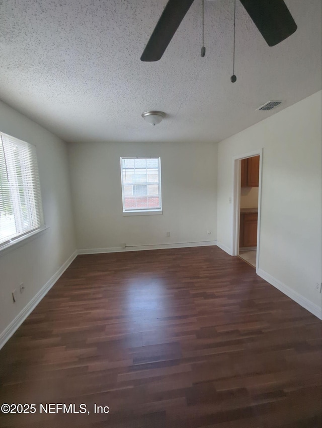 3136 Post St, Jacksonville, FL 32205 - unfurnished room with a ceiling fan, a textured ceiling, and wood finished floors