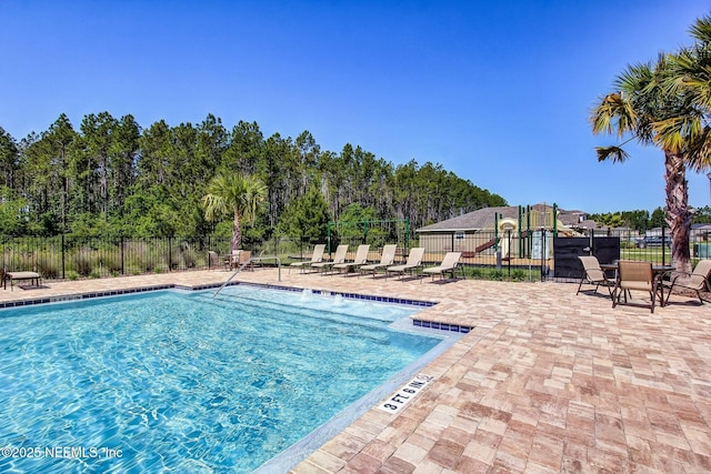 78262 Saddle Rock Rd, Yulee, FL 32097 - community pool with a patio