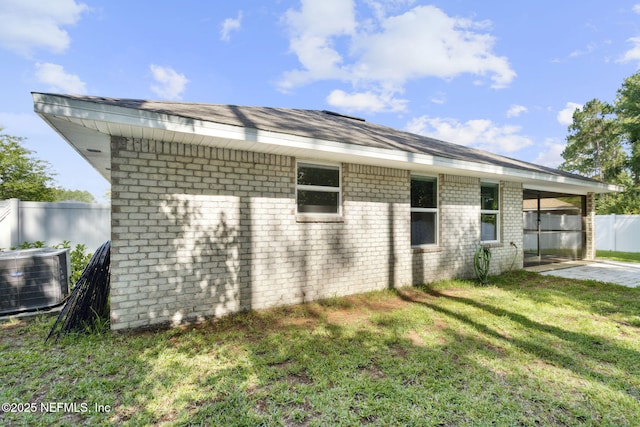 78262 Saddle Rock Rd, Yulee, FL 32097 - view of side of property with a central air condition unit and brick siding