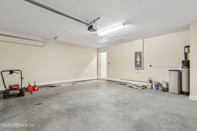 78262 Saddle Rock Rd, Yulee, FL 32097 - garage featuring electric panel and a garage door opener
