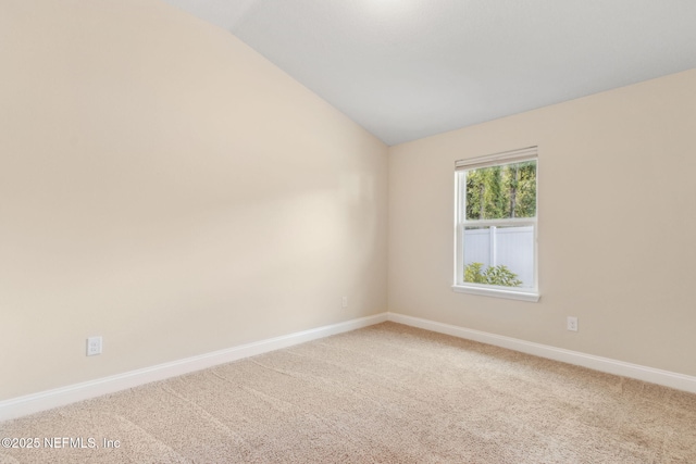 78262 Saddle Rock Rd, Yulee, FL 32097 - spare room featuring lofted ceiling and carpet flooring