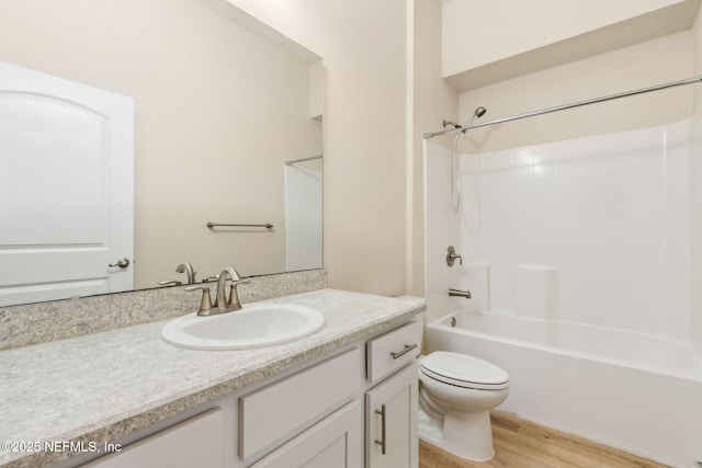 78262 Saddle Rock Rd, Yulee, FL 32097 - bathroom with vanity, wood finished floors, and bathtub / shower combination