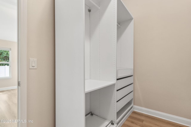78262 Saddle Rock Rd, Yulee, FL 32097 - walk in closet featuring light wood-type flooring