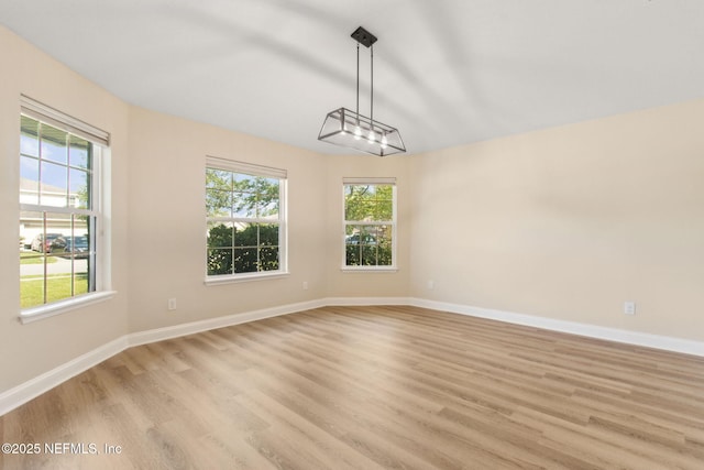 78262 Saddle Rock Rd, Yulee, FL 32097 - unfurnished room featuring healthy amount of natural light and light wood finished floors