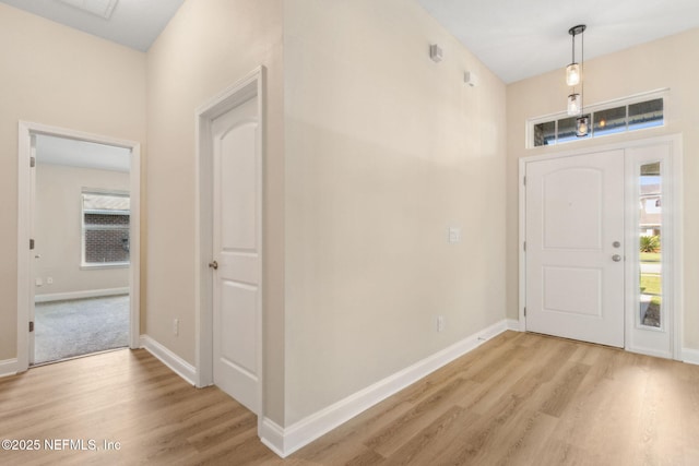 78262 Saddle Rock Rd, Yulee, FL 32097 - entryway with light wood finished floors and healthy amount of natural light