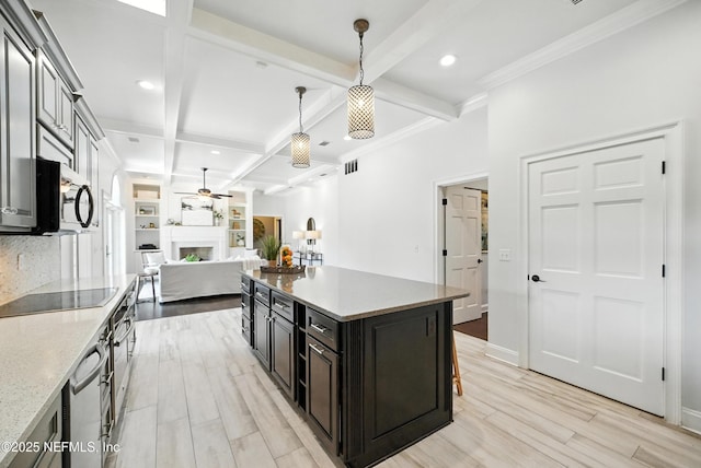 8483 Stables Rd, Jacksonville, FL 32256 - kitchen featuring a ceiling fan, black electric cooktop, light wood finished floors, coffered ceiling, and beam ceiling