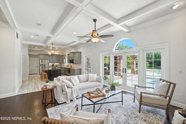 8483 Stables Rd, Jacksonville, FL 32256 - living room with french doors, coffered ceiling, beam ceiling, a ceiling fan, and wood finished floors