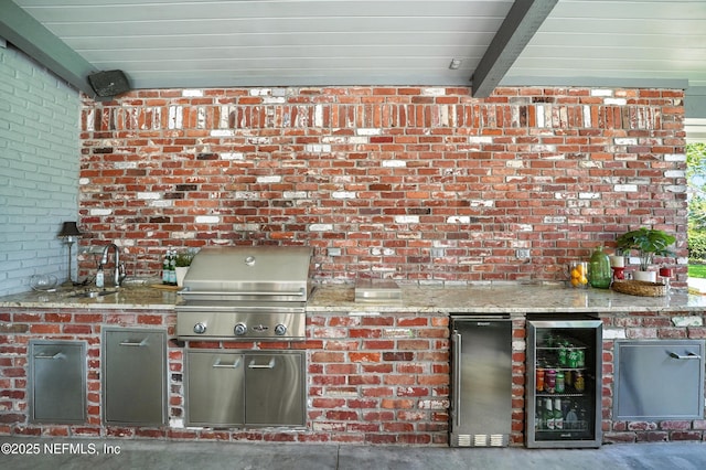 8483 Stables Rd, Jacksonville, FL 32256 - view of patio / terrace featuring wine cooler and exterior kitchen