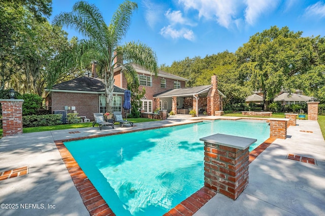 8483 Stables Rd, Jacksonville, FL 32256 - swimming pool featuring a patio and a gazebo
