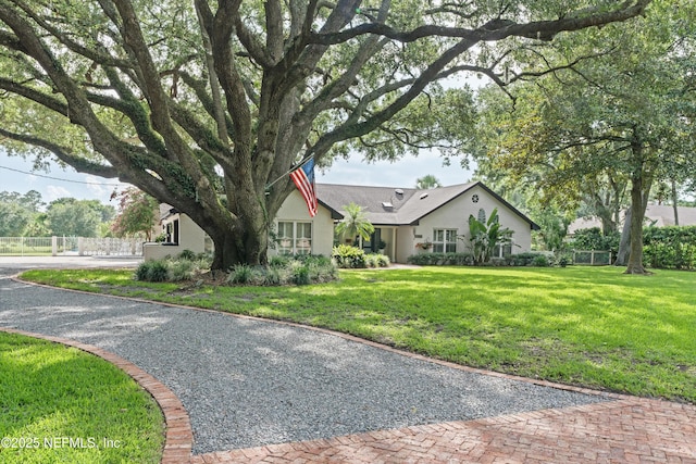 1786 Selva Marina Dr, Atlantic Beach, FL 32233 - ranch-style home with gravel driveway