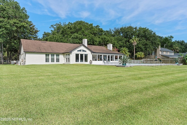 1786 Selva Marina Dr, Atlantic Beach, FL 32233 - back of house with a chimney and a patio
