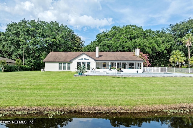 1786 Selva Marina Dr, Atlantic Beach, FL 32233 - back of house featuring a patio area, a chimney, and a water view