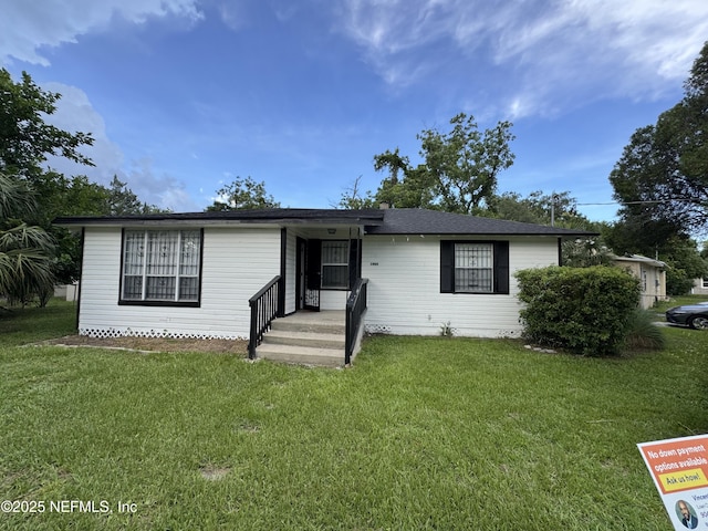 6554 New Kings Rd, Jacksonville, FL 32219 - view of front of house featuring a front yard