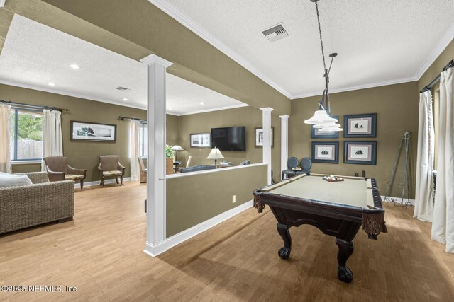 5811 Atlantic Blvd Unit 25, Jacksonville, FL 32207 - playroom featuring ornate columns, light wood-style floors, pool table, a textured ceiling, and ornamental molding