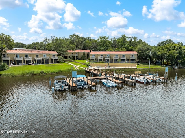 5811 Atlantic Blvd Unit 25, Jacksonville, FL 32207 - dock area with a water view, view of scattered trees, and a lawn