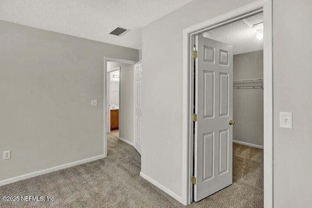 3164 Ravines Rd, Middleburg, FL 32068 - hallway featuring carpet and a textured ceiling