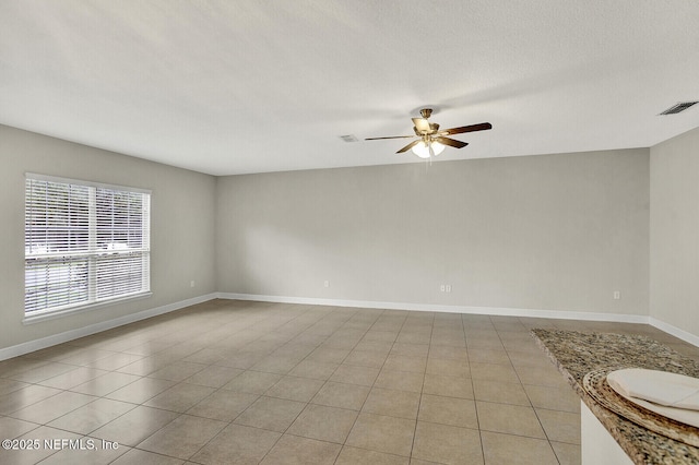 3164 Ravines Rd, Middleburg, FL 32068 - unfurnished room with ceiling fan and light tile patterned floors