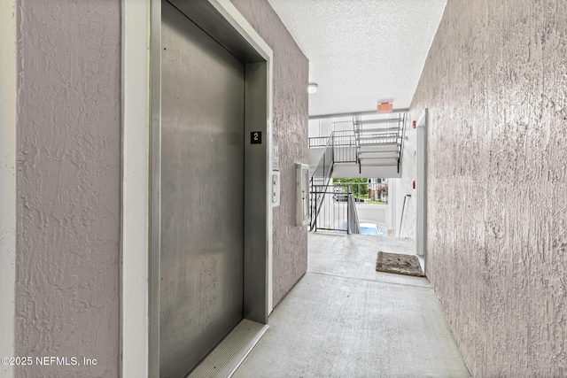 160 Legendary Dr Unit 204, Saint Augustine, FL 32092 - hallway with a textured ceiling