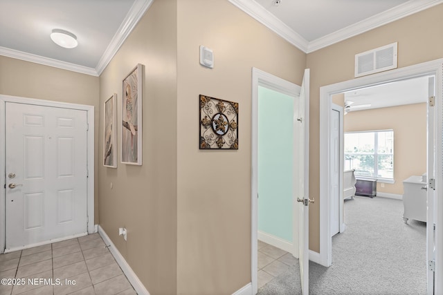 160 Legendary Dr Unit 204, Saint Augustine, FL 32092 - foyer entrance with ornamental molding, light tile patterned flooring, and light colored carpet