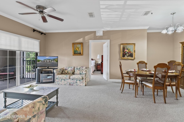 160 Legendary Dr Unit 204, Saint Augustine, FL 32092 - living room featuring carpet, crown molding, ceiling fan, and a chandelier