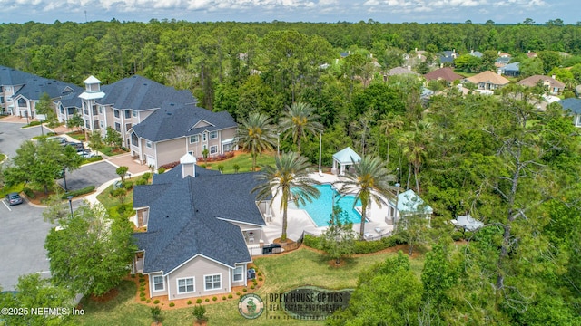 160 Legendary Dr Unit 204, Saint Augustine, FL 32092 - view of subject property featuring a heavily wooded area and a pool area