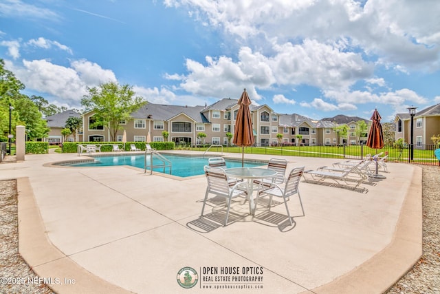 160 Legendary Dr Unit 204, Saint Augustine, FL 32092 - community pool with a patio area and a residential view