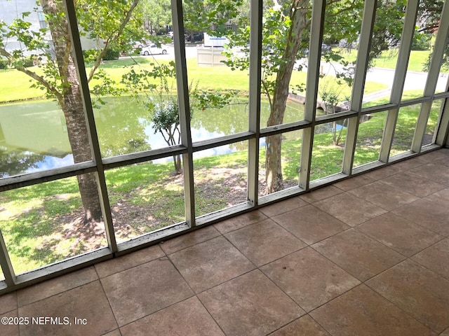 1102 Wood Hill Pl Unit 1102, Jacksonville, FL 32256 - unfurnished sunroom with a water view