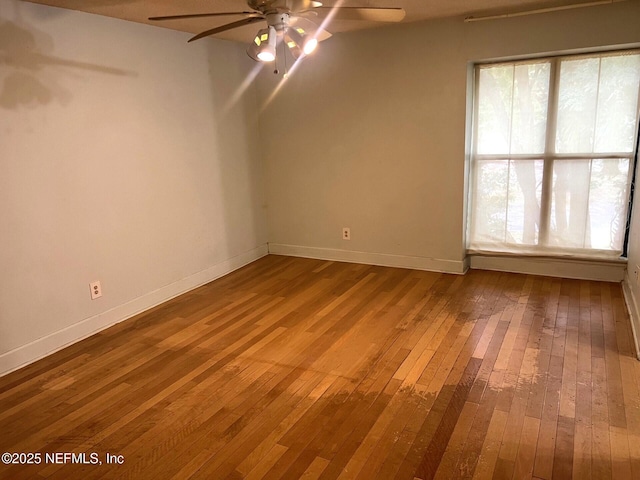 1102 Wood Hill Pl Unit 1102, Jacksonville, FL 32256 - spare room with ceiling fan and hardwood / wood-style flooring
