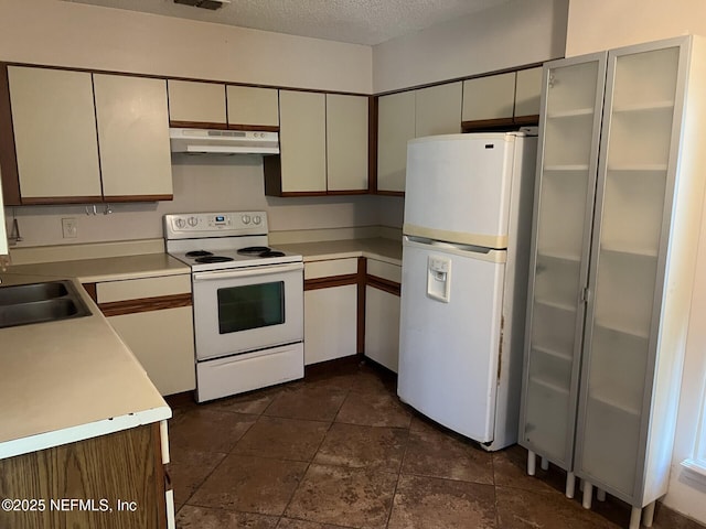 1102 Wood Hill Pl Unit 1102, Jacksonville, FL 32256 - kitchen with white appliances, under cabinet range hood, light countertops, and a textured ceiling