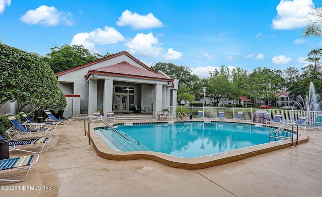 1102 Wood Hill Pl Unit 1102, Jacksonville, FL 32256 - community pool featuring french doors and a patio area