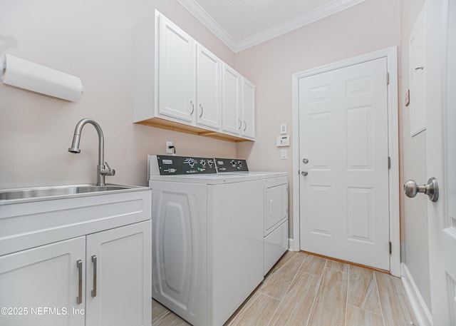 1356 Barrington Cir, Saint Augustine, FL 32092 - laundry area featuring washing machine and clothes dryer, cabinet space, and crown molding