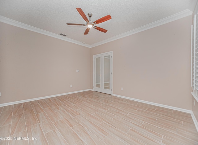 1356 Barrington Cir, Saint Augustine, FL 32092 - spare room with a ceiling fan, french doors, light wood-style floors, ornamental molding, and a textured ceiling