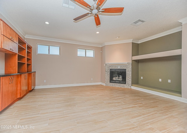 1356 Barrington Cir, Saint Augustine, FL 32092 - unfurnished living room with a ceiling fan, ornamental molding, a tile fireplace, and recessed lighting