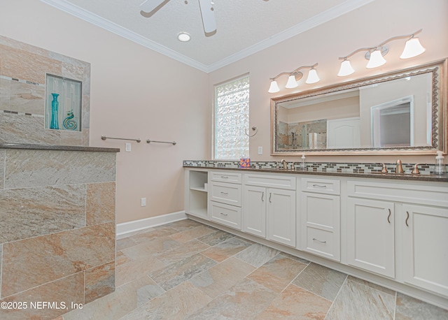 1356 Barrington Cir, Saint Augustine, FL 32092 - bathroom featuring ornamental molding, vanity, a tile shower, a ceiling fan, and stone tile flooring