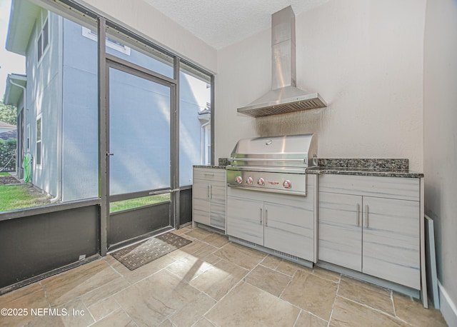1356 Barrington Cir, Saint Augustine, FL 32092 - kitchen with wall chimney exhaust hood, a textured ceiling, and gray cabinetry