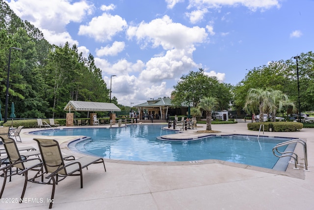 1356 Barrington Cir, Saint Augustine, FL 32092 - community pool featuring a patio area