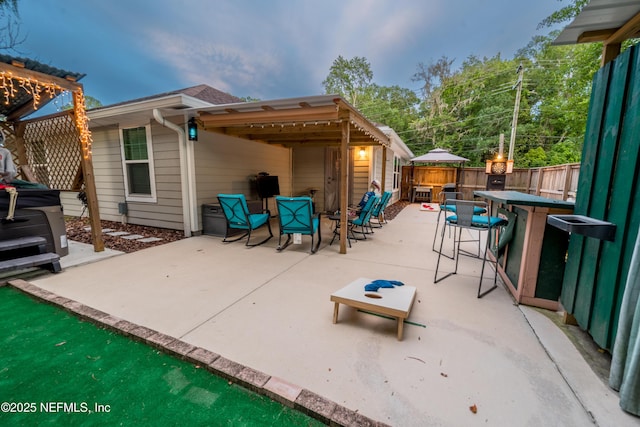 210 N Saint Clair St, Starke, FL 32091 - fenced backyard with outdoor dining area, a patio area, and a jacuzzi