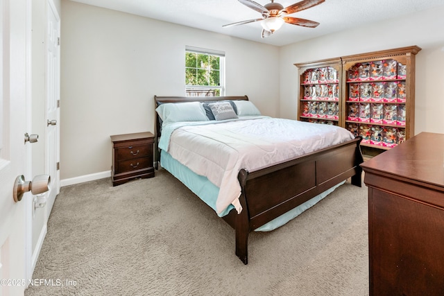 210 N Saint Clair St, Starke, FL 32091 - bedroom featuring light colored carpet and ceiling fan