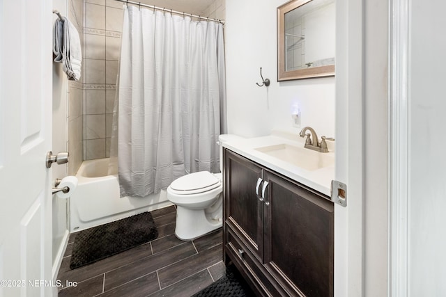 210 N Saint Clair St, Starke, FL 32091 - full bathroom featuring vanity, wood finished floors, and shower / bath combo