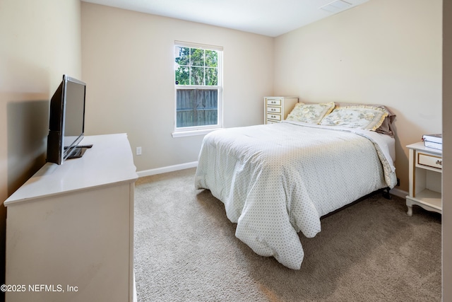 210 N Saint Clair St, Starke, FL 32091 - bedroom featuring carpet floors and baseboards