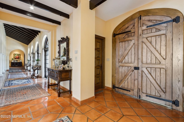 1185 Ponte Vedra Blvd, Ponte Vedra Beach, FL 32082 - foyer with arched walkways, tile patterned flooring, and ornate columns