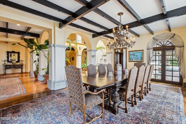 1185 Ponte Vedra Blvd, Ponte Vedra Beach, FL 32082 - dining space featuring ornate columns, beam ceiling, a chandelier, wood finished floors, and arched walkways