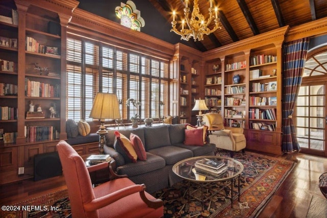 1185 Ponte Vedra Blvd, Ponte Vedra Beach, FL 32082 - living area featuring bookshelves, built in shelves, a chandelier, wooden ceiling, and plenty of natural light