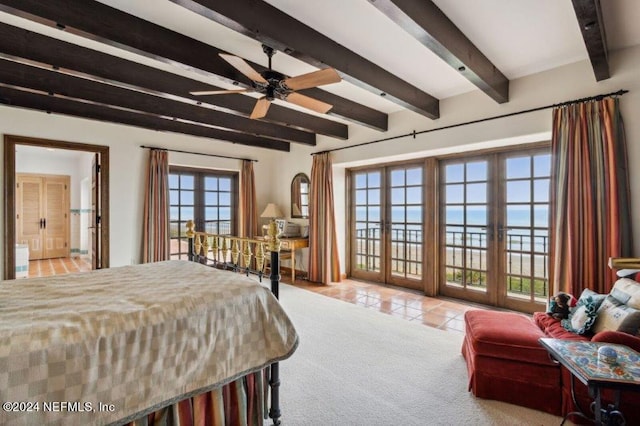 1185 Ponte Vedra Blvd, Ponte Vedra Beach, FL 32082 - tiled bedroom with beam ceiling, french doors, access to outside, and carpet flooring