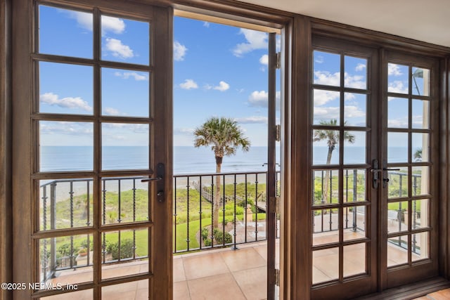1185 Ponte Vedra Blvd, Ponte Vedra Beach, FL 32082 - doorway with a water view, french doors, and light tile patterned flooring