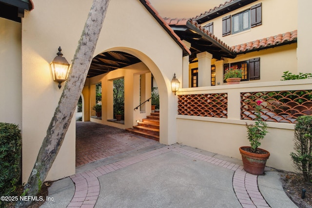 1185 Ponte Vedra Blvd, Ponte Vedra Beach, FL 32082 - doorway to property with stucco siding and a tile roof