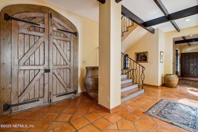 1185 Ponte Vedra Blvd, Ponte Vedra Beach, FL 32082 - tiled foyer entrance featuring a barn door, beam ceiling, stairs, recessed lighting, and coffered ceiling